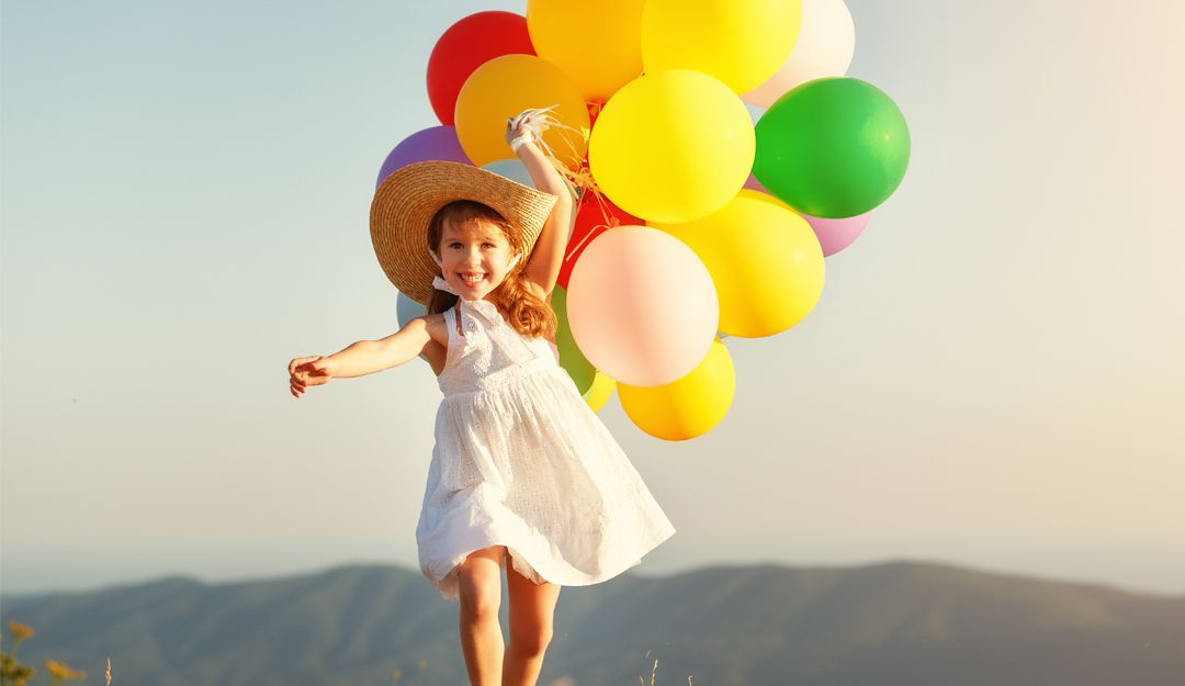 Mädchen mit Luftballons